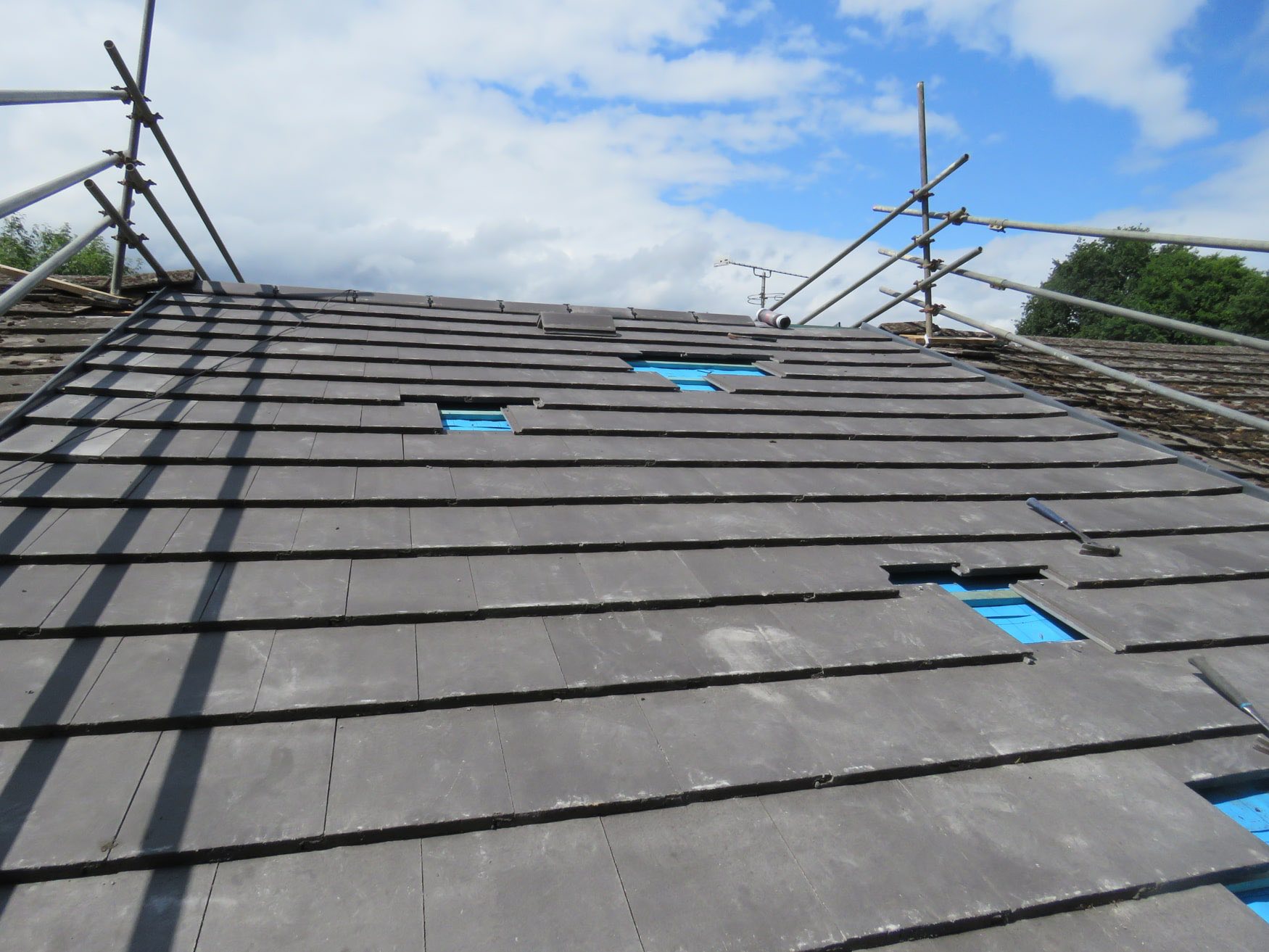 Natural slate roof repair in Mullion