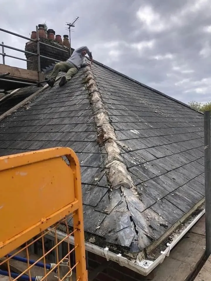 Slate roof ridge and chimney repair in Mullion